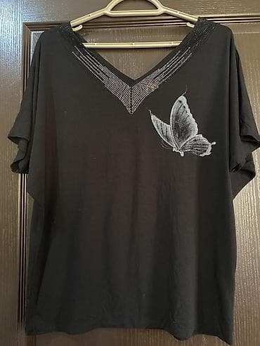 Qadın köynəyi – qara rəng, V-yaxa, qısa qollu. Ölçü 40-L. 42-XL. Tam — 5