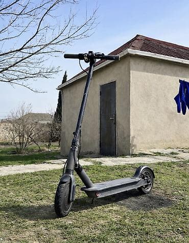 Elektrik nəqliyyatı: Elektrik skuter – şık qara dizayn, şəhərdaxili rahat hərəkət üçün — 1