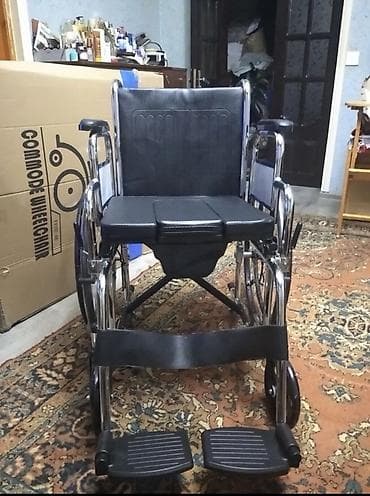 Digər tibbi məhsullar: Tualet funksiyalı əlil arabası (commode wheelchair) - Oturacaqda — 1