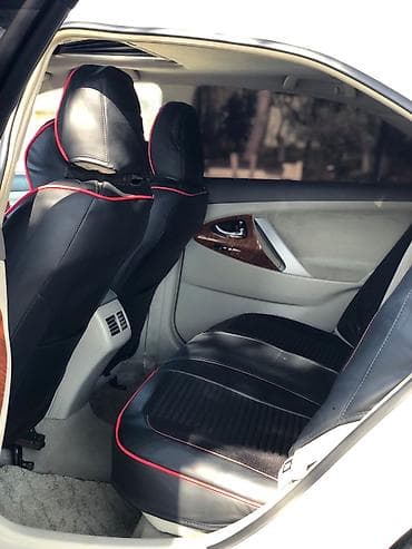 oka satisi: Toyota Camry (XV40) – ağ rəngli sedan. Xarici xüsusiyyətlər: - GLX — 5