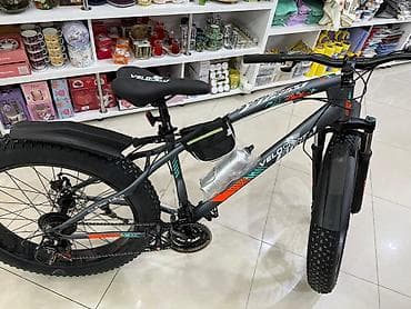 motorlu velik: Fatbike tipli dağ velosipedi - Brend/model üzərində yazı: VELOSTRIM — 1