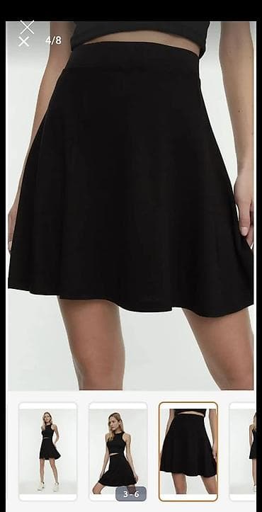 qara etek: Qara mini ətək - Kəsim: A-kəsim, ətəyin aşağı hissəsi yüngülcə — 2