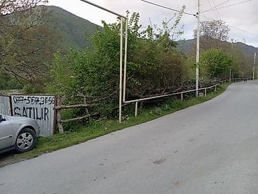 güneşlide kiraye ev: Bağ Şəki Rayon Baş Zəyzid kəndində yerləşir . 27 sottam asfaltin — 2