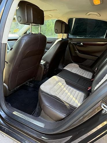 masin hisselerinin adlari: Volkswagen Passat: 2 l | 2012 il Sedan — 8