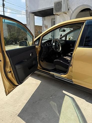 Motonəqliyyat: Nissan Tiida: 1.6 l | 2012 il Hetçbek — 3