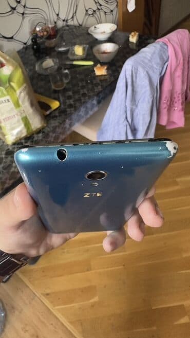 телефон fly iq4412 quad: ZTE v889m, 512 ГБ, цвет - Голубой, Кнопочный, Сенсорный, Отпечаток пальца — 3