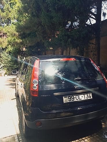 w210 disk: Ford Fiesta hatchback, 2007 il 1.3 matortünd göy rəng. 5 qapı, kompakt — 4