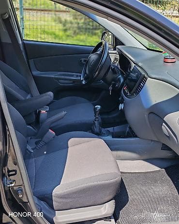 opel omega oluxana: Kia Rio: 1.4 l | 2006 il Sedan — 9