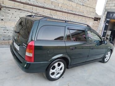 ремонт сидений авто: Opel Astra Caravan (universal) – tünd yaşıl rəng • Kuzov: universal — 9