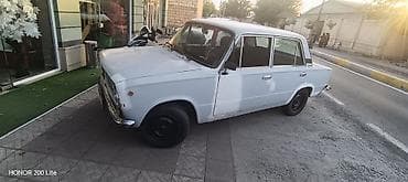 Транспорт: VAZ 2101 “Jiquli” sedan - Korpus: ağ rəng, 4 qapı, xrom bamperlər — 4