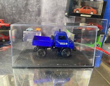 metbex tavan modelleri: Коллекционная модель Mercedes-Benz Unimog U411 Technical Relief blue — 7
