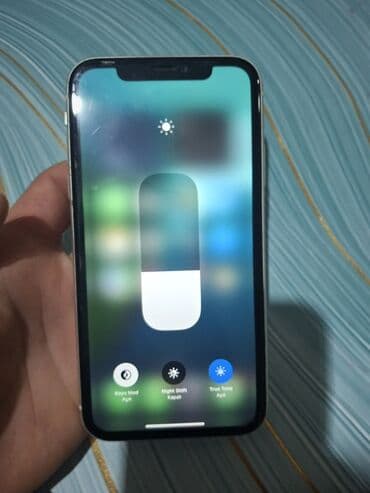 a 10 s: IPhone 11, Ağ, Face ID — 5