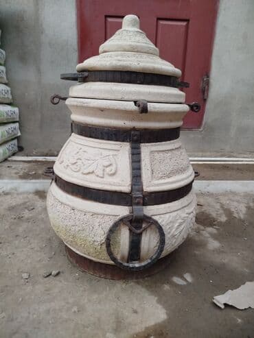 Yemək bişirmək üçün ideal, dekorativ naxışlarla bəzədilmiş gil təndir