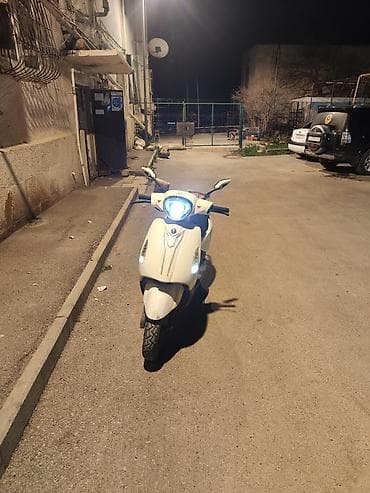 baqaj toru: Şəhər içi sürüş üçün praktik və qənaətcil skuter. Əsas xüsusiyyətlər — 2