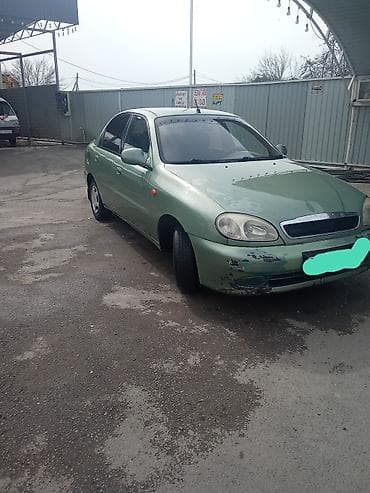mersedes yan guzguler: Daewoo Lanos: 1.3 l | 2009 il Sedan — 2