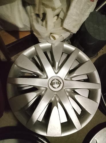 Nissan orijinal təkər diski (kaps) – gümüş rəng. - Marka/loqo: Nissan