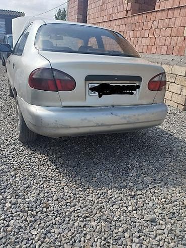 tap az traktor t28: Daewoo Lanos: 1.3 l | 2010 il Sedan — 2