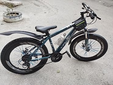 velosiped ural: Dağ velosipedi – 24” təkərlər, enli protektorlu şinlər. Rəng: tünd — 9