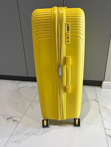 Спортивное питание: Sarı rəngli sərt qabıqlı çamadan səyahət üçün nəzərdə tutulmuşdur — 4