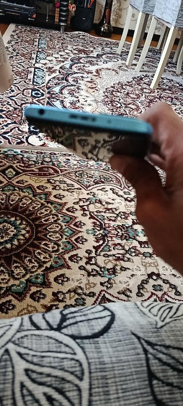 Бытовая техника: Redmi 10 (2022), 128 ГБ, цвет - Голубой, Сенсорный — 1