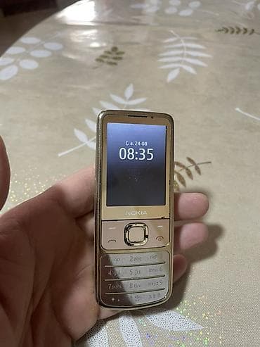 nokia 6700 satilir: Nokia 6700 Slide, rəng - Qızılı, Düyməli — 3