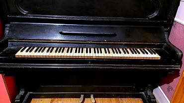 piano az: Upright pianino – klassik dizaynlı, qara rəngdə korpus. - 88 klavişli — 4