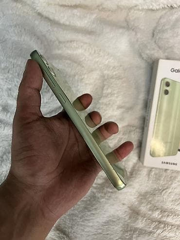 soba satilir: Samsung Galaxy A05, 64 GB, rəng - Yaşıl, Barmaq izi, Face ID — 8