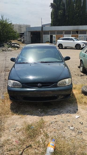 jeton satişi: Kia Sephia: 1.6 l | 1997 il Sedan — 1