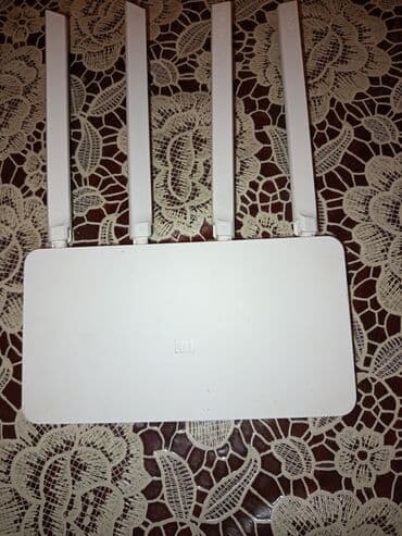 модем купить: Xiaomi Mi Wi‑Fi Router (4 antennali) - Brend: Xiaomi (Mi loqosu ilə) — 1