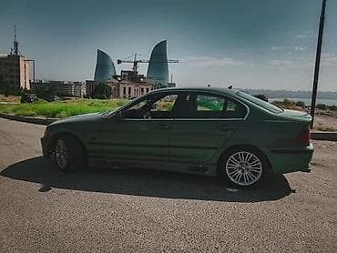 mazda 2: BMW 3 series: 2.5 l | 2000 il Sedan — 5