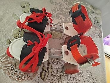 Uşaq üçün tənzimlənən dördtəkərli konki (üstündən geyilən model) -