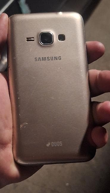 ucuz samsung telefonları: Samsung Galaxy J1 2016, rəng - Qızılı, İki sim kartlı — 2