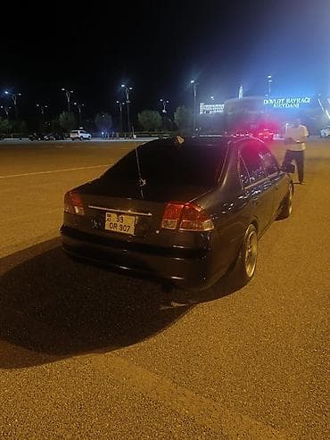 klas 6: Honda Civic: 1.6 l | 2003 il Sedan — 2