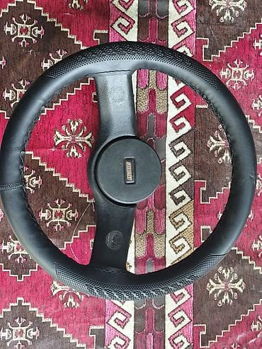 Salon: Avtomobil sükanı - Material: dəri örtüklü, tutacaq hissələrində — 1