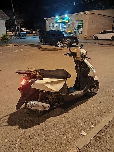 baqaj toru: Şəhər içi sürüş üçün praktik və qənaətcil skuter. Əsas xüsusiyyətlər — 4