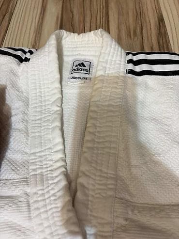 notebook cantaları: İdman dəsti – döyüş növləri üçün Komplektin tərkibi: - Adidas Judo — 2