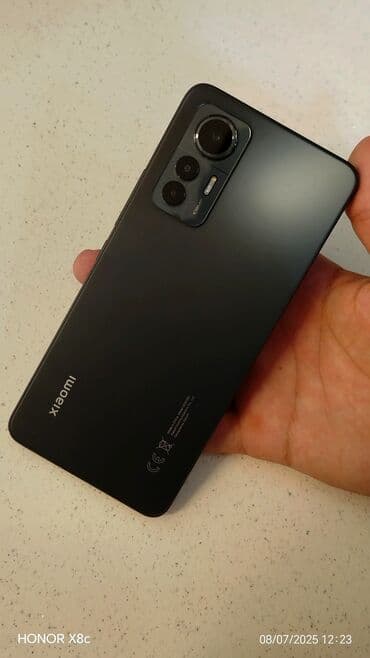 xiaomi 14 qiymet: Xiaomi 12, 256 ГБ, цвет - Черный, 
 Сенсорный, Отпечаток пальца, Две SIM карты — 1