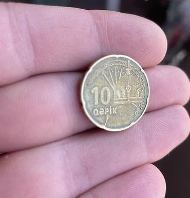 qepik pullar: Məhsul: Azərbaycan 10 qəpik brak sikkəsi Təsvir: - Nominal: 10 qəpik — 2