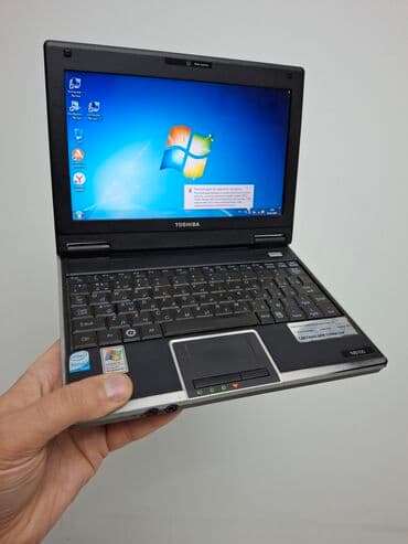 asus vivobook 15: Toshiba NB100 netbuku Masazirdadi Xüsusiyyətlər: - Ekran: 8.9" (parlaq — 1