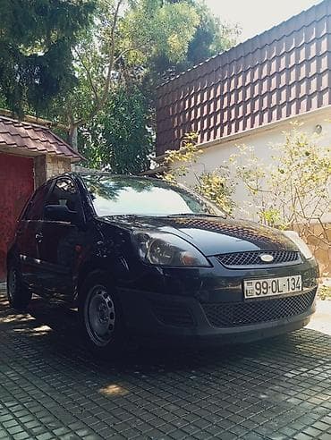 w210 disk: Ford Fiesta hatchback, 2007 il 1.3 matortünd göy rəng. 5 qapı, kompakt — 2