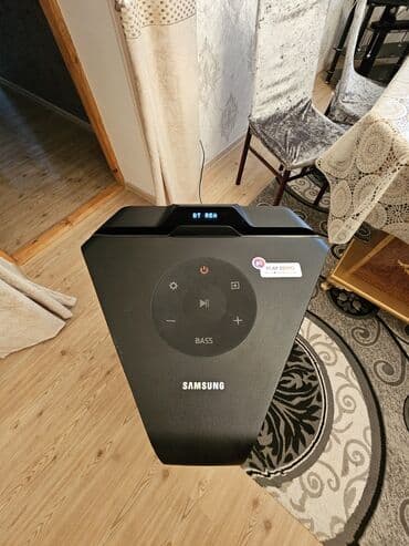 telefon plata satisi: Samsung partı spikeri (Bluetooth DJ audio sistemi) üstündə planşet — 2