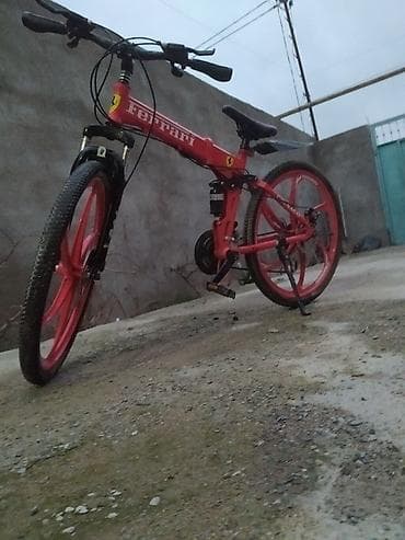 cube velo: Ferrari qatlanan dağ velosipedi, qırmızı rəngdədir və qatlanan — 3