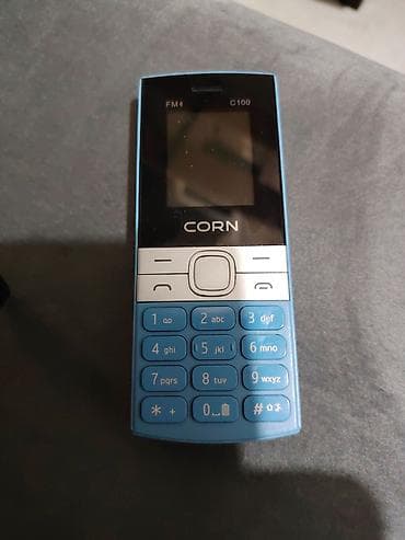 isdenmis telefonlar: CORN C100 düyməli mobil telefon - Rəng: mavi korpus, gümüş rəngli — 1