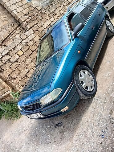 opel astra oluxanasi: Opel Astra F Caravan (universal), mavi rəng Xüsusiyyətlər:.1997 - — 3