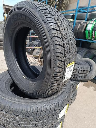 mon af50: Şin Dunlop 265 / 65 / R 17 — 7