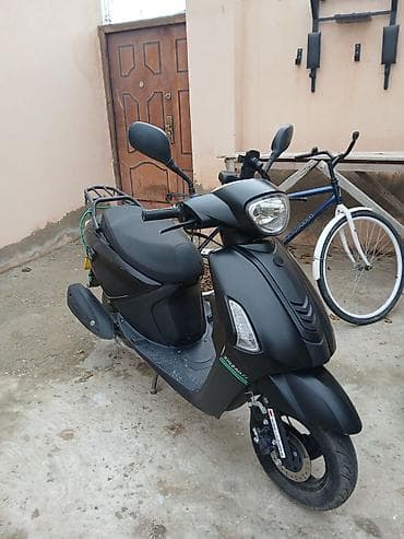 teker lada: Şəhər içi hərəkət üçün kompakt skuter - Rəng: mat qara - Korpus — 2