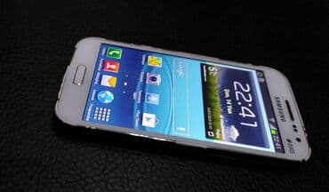 кнопка телефон: Samsung Galaxy Win 2, цвет - Белый, Две SIM карты — 2
