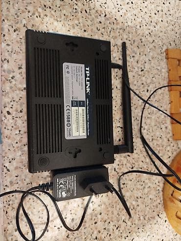 ucuz modemler: TP-LINK TD-W8961G simsiz ADSL2+ modem router. Model etiketində — 1