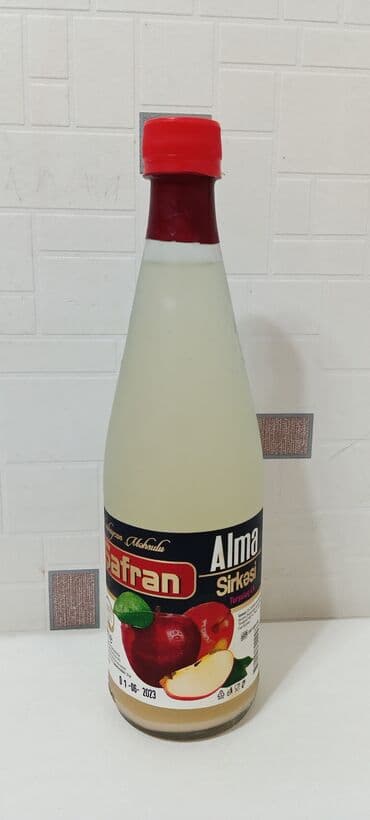 Tebii evde hazirlanmiw alma sirkesi satilir terkibinde hec bir qatqi