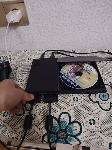 Sony PlayStation 2 Slim oyun konsolu - Model: PS2 Slim (SCPH